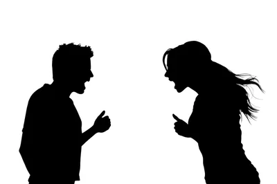 Silhouettes Of A Man And Woman Arguing