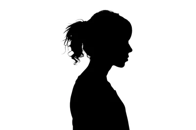 Silhouette Of A Young Woman In Profile