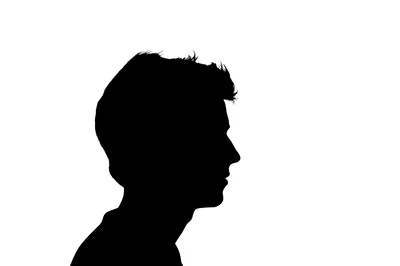 Silhouette Of A Young Man In Profile