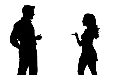 Silhouettes Of A Man And Woman Conversing