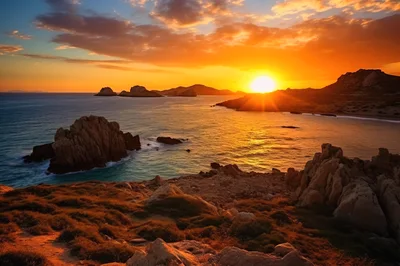 Golden Sunset Over Rocky Coastal Landscape