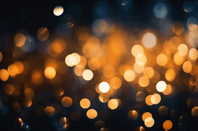 Abstract Golden Bokeh Lights On Dark Background