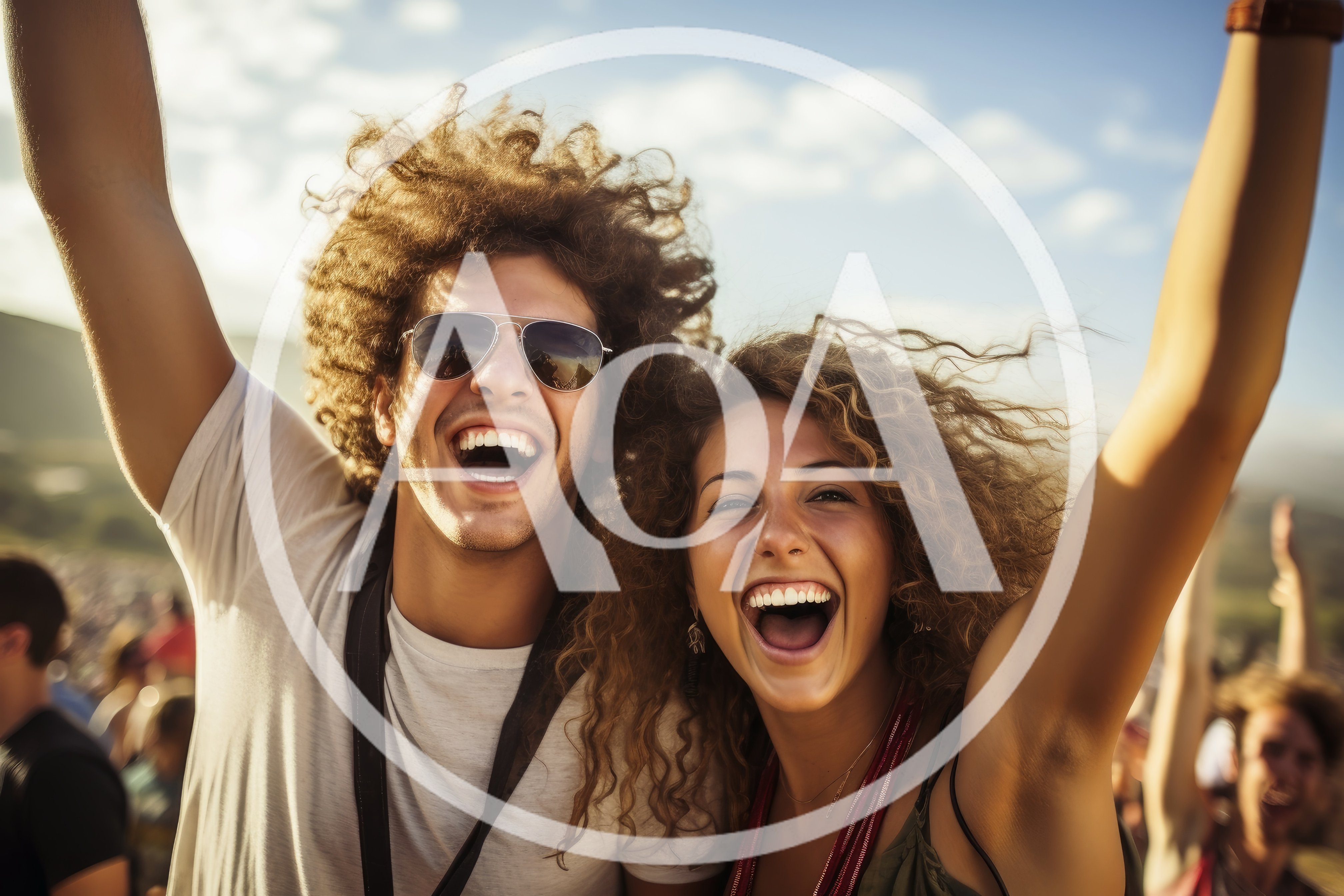 Young Couple Celebrating Joyfully at an Outdoor Music Festival