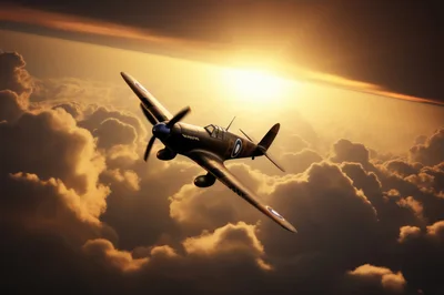 Vintage Supermarine Spitfire Flying Above Golden Clouds