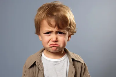 Portrait Of A Sad Young Boy