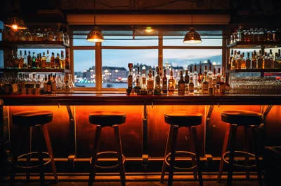 Empty Bar Counter With Stools And City View