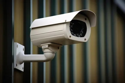 Outdoor Security Camera Mounted On A Metal Wall