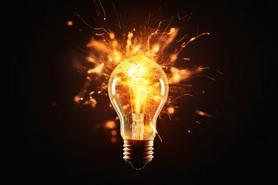 Glowing Light Bulb With Explosive Sparks