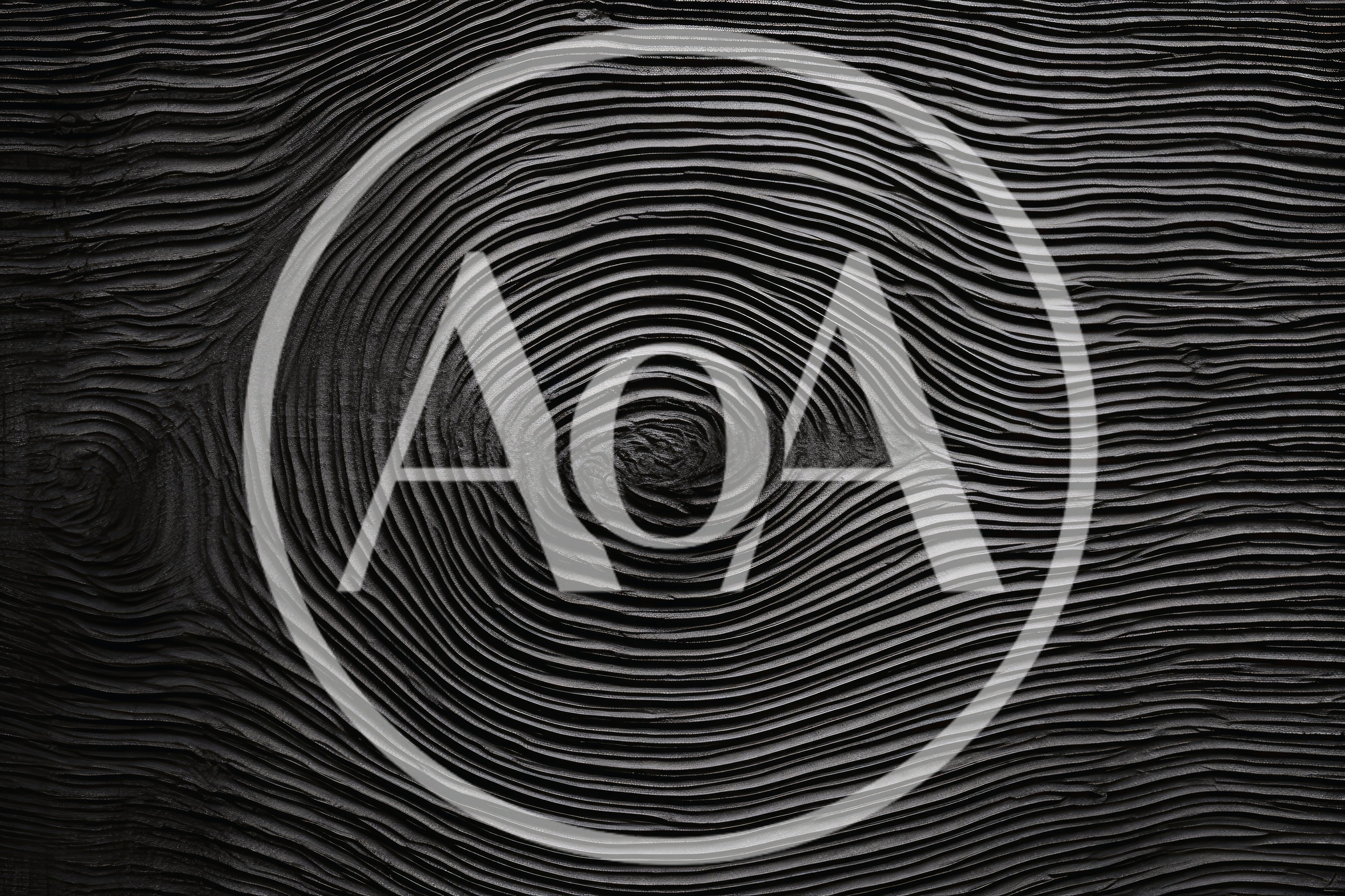 Black Wood Grain Texture With Concentric Circular Patterns