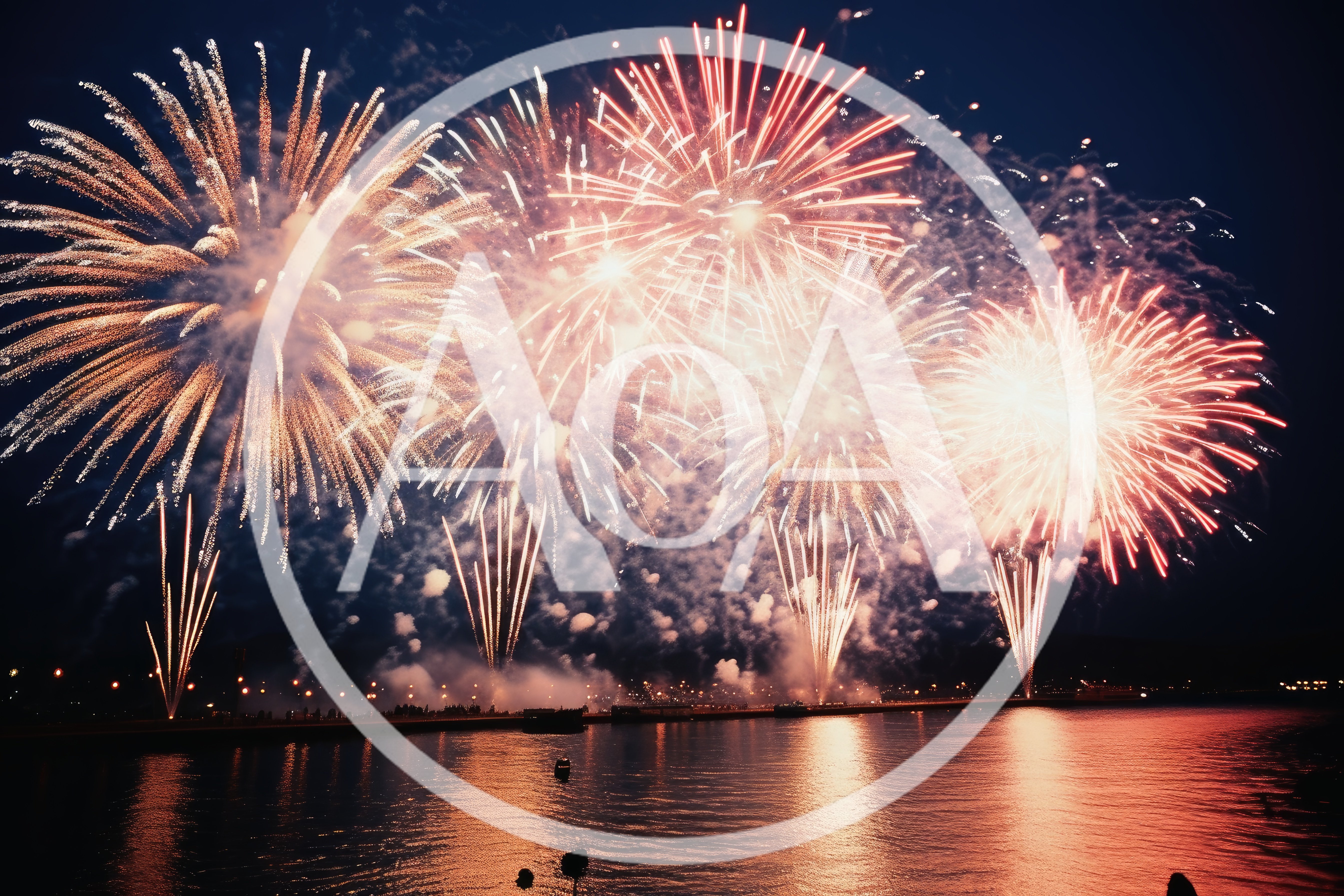 Vibrant Fireworks Display Over A Calm Waterfront