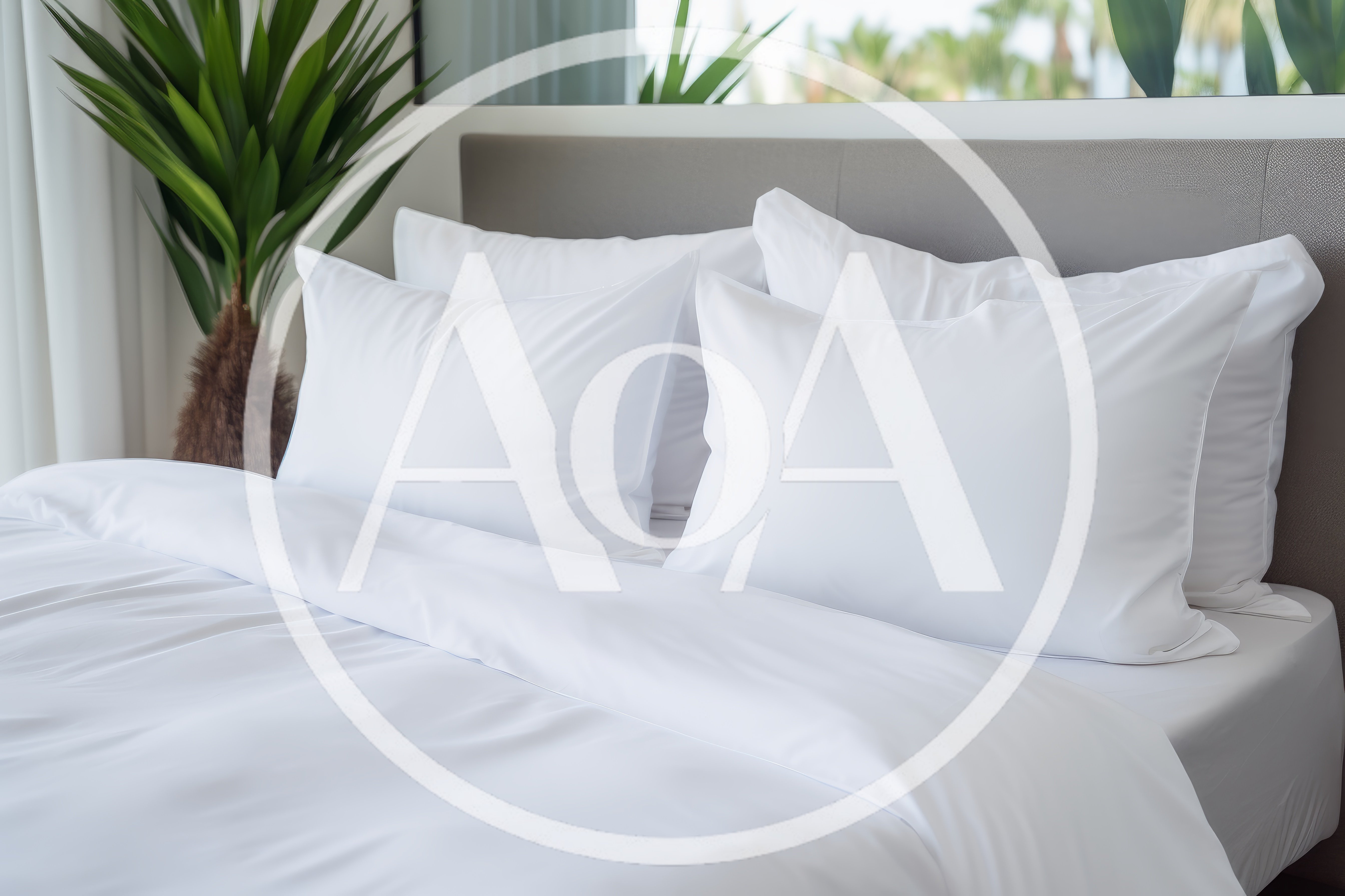 White Bedding With Pillows In A Modern Bedroom