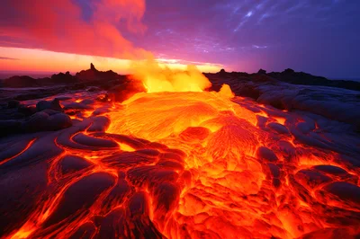 Molten Lava Flowing Over Volcanic Rock Landscape