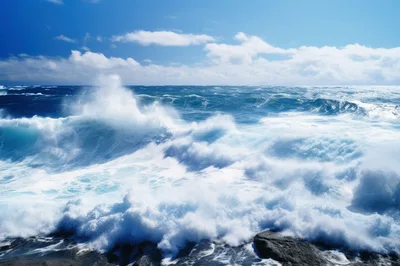 Powerful Ocean Waves Crashing Against Rocky Shoreline