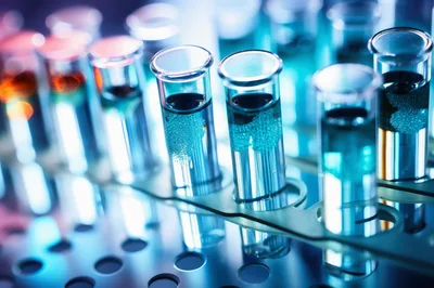 Laboratory Test Tubes With Blue Chemical Solutions