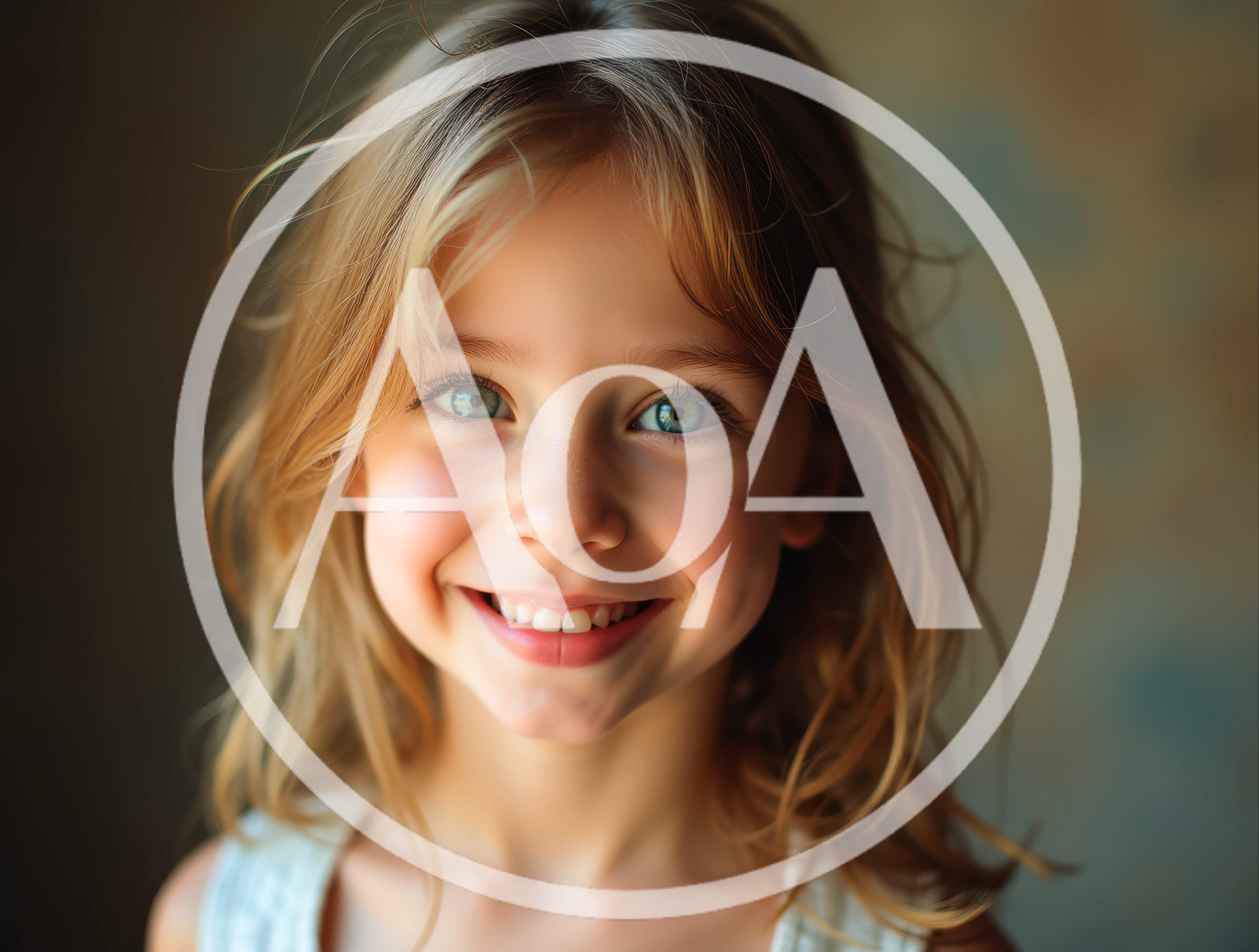 Portrait Of A Smiling Young Girl With Blonde Hair