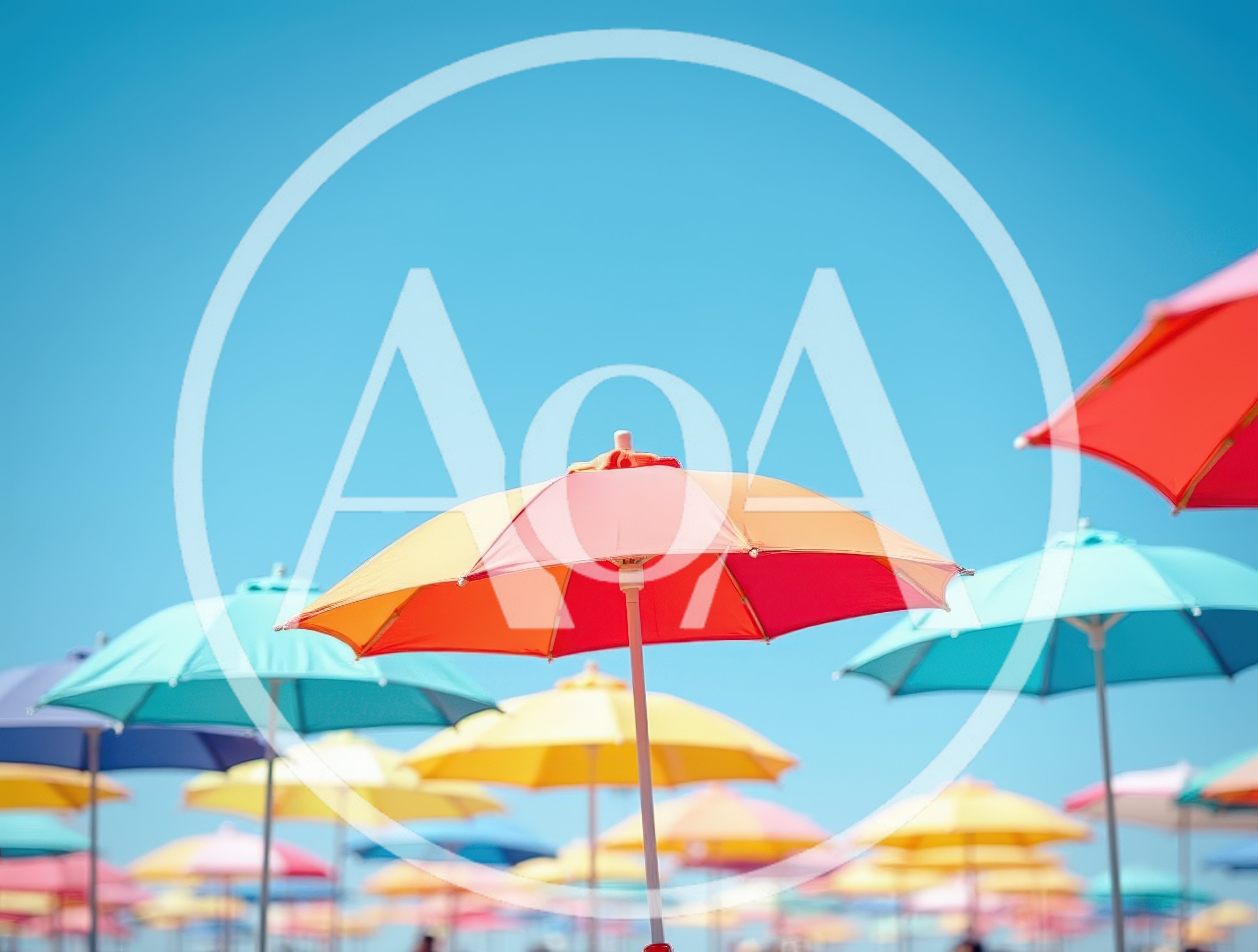 Colorful Beach Umbrellas Under A Clear Blue Sky