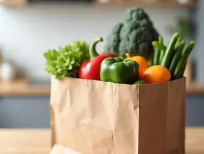 Paper Grocery Bag Filled With Fresh Vegetables And Fruit