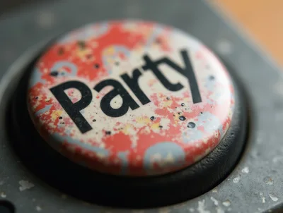 Close Up Of A Party Button On A Console