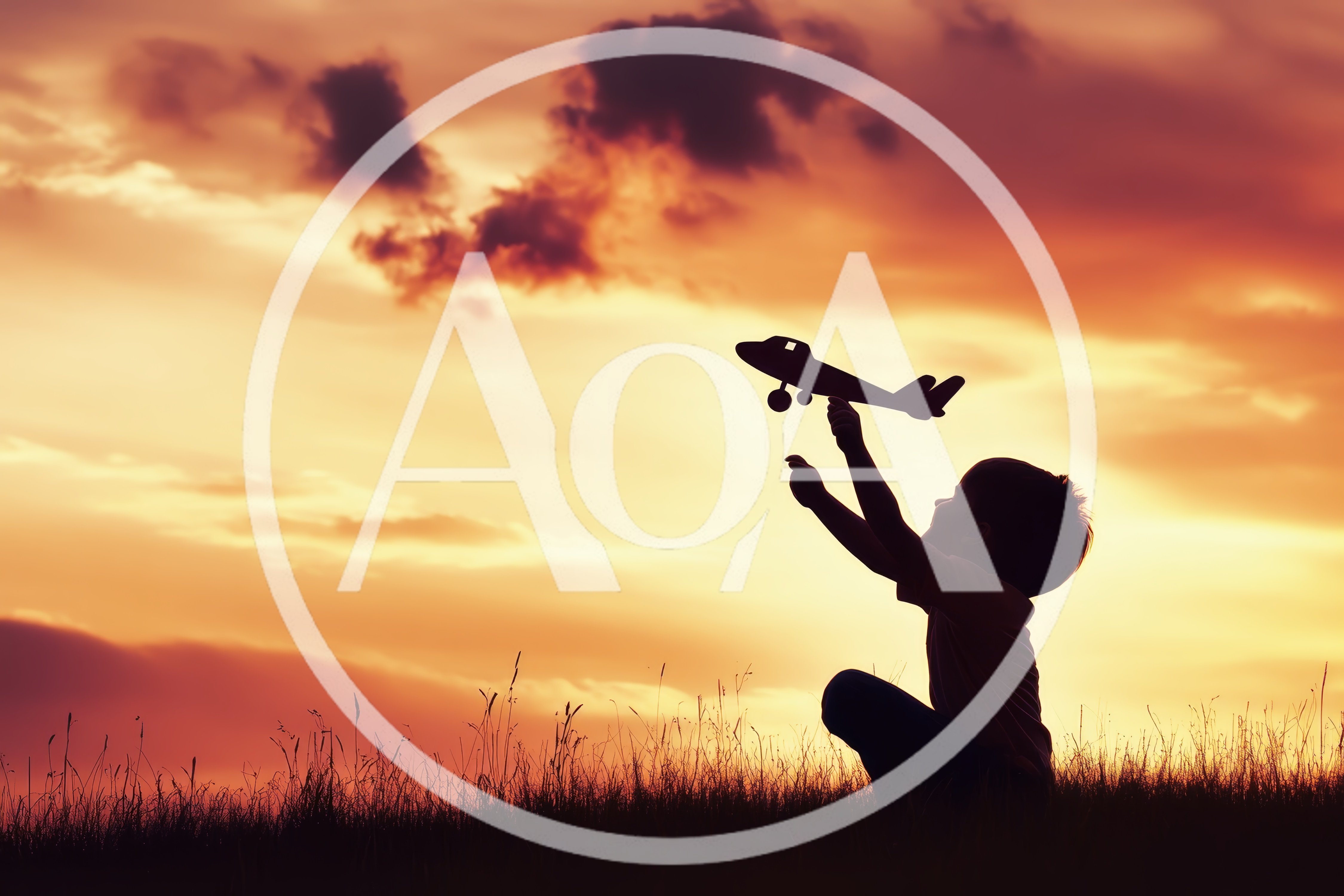 Young Boy Playing With Toy Airplane At Sunset