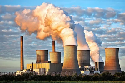 Industrial Power Plant Cooling Towers Emitting Steam
