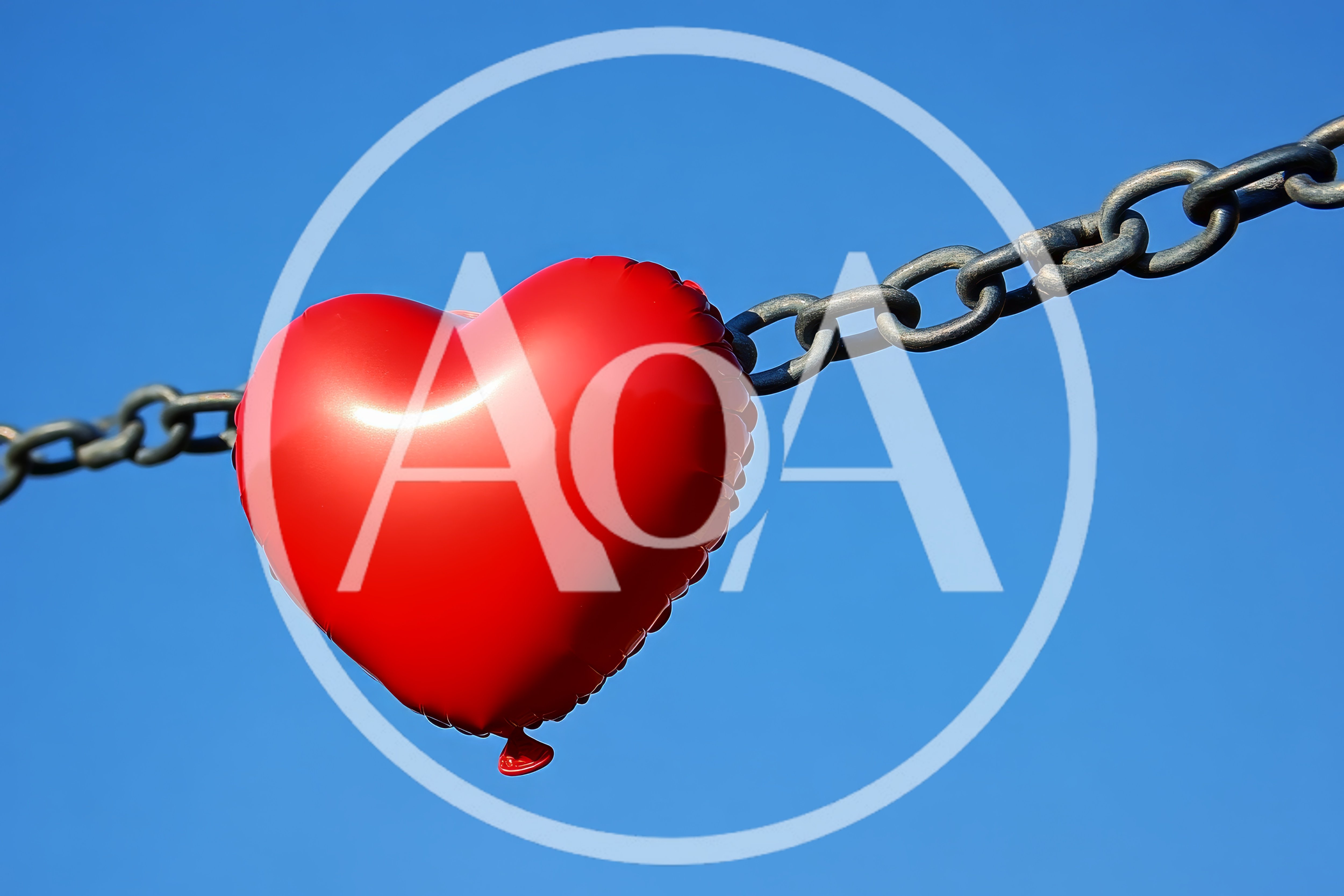 Red Heart Balloon Attached To A Metal Chain