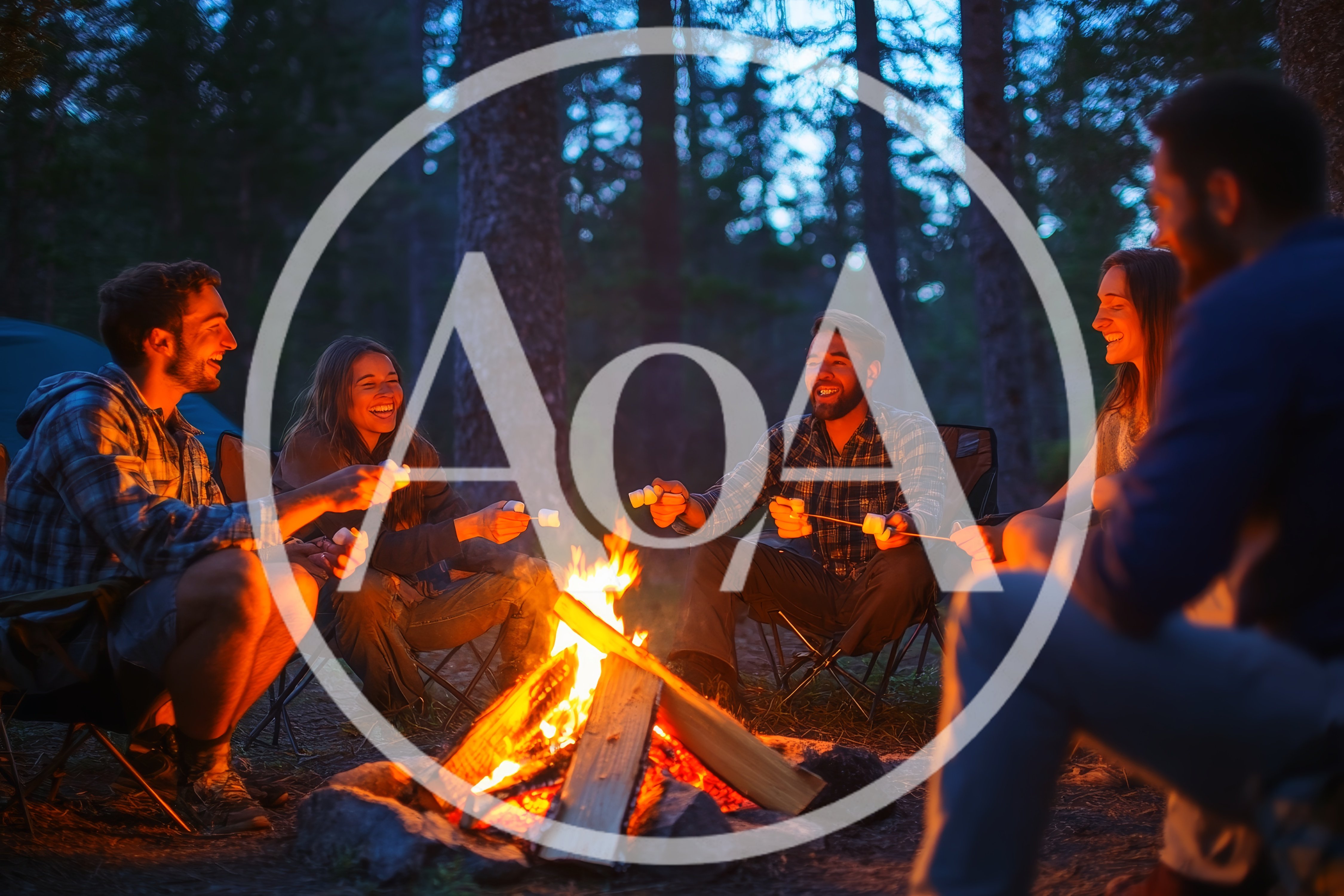 Friends Roasting Marshmallows Over A Campfire At Night