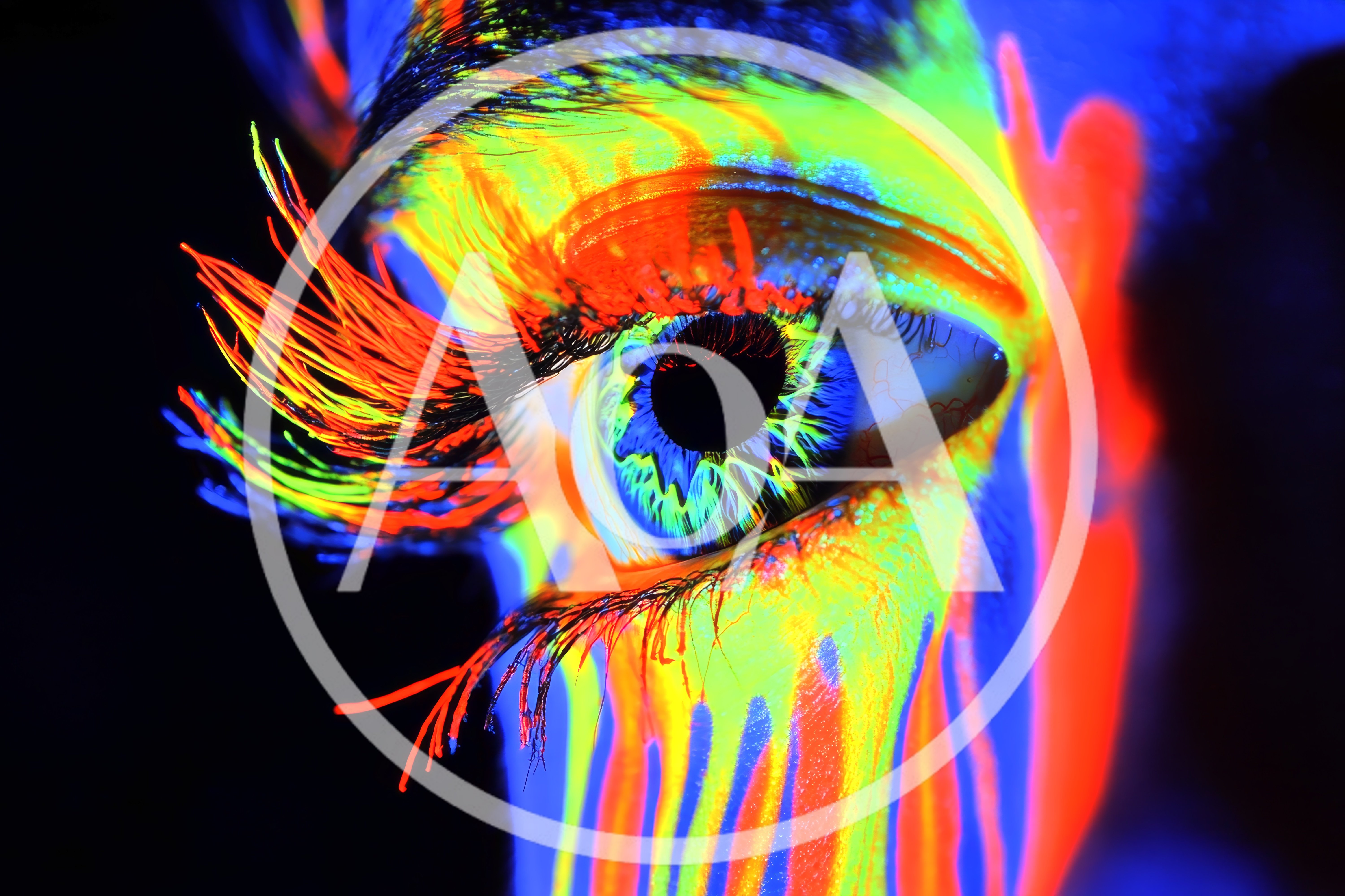 Extreme Close Up Of Neon Fluorescent Eye Makeup