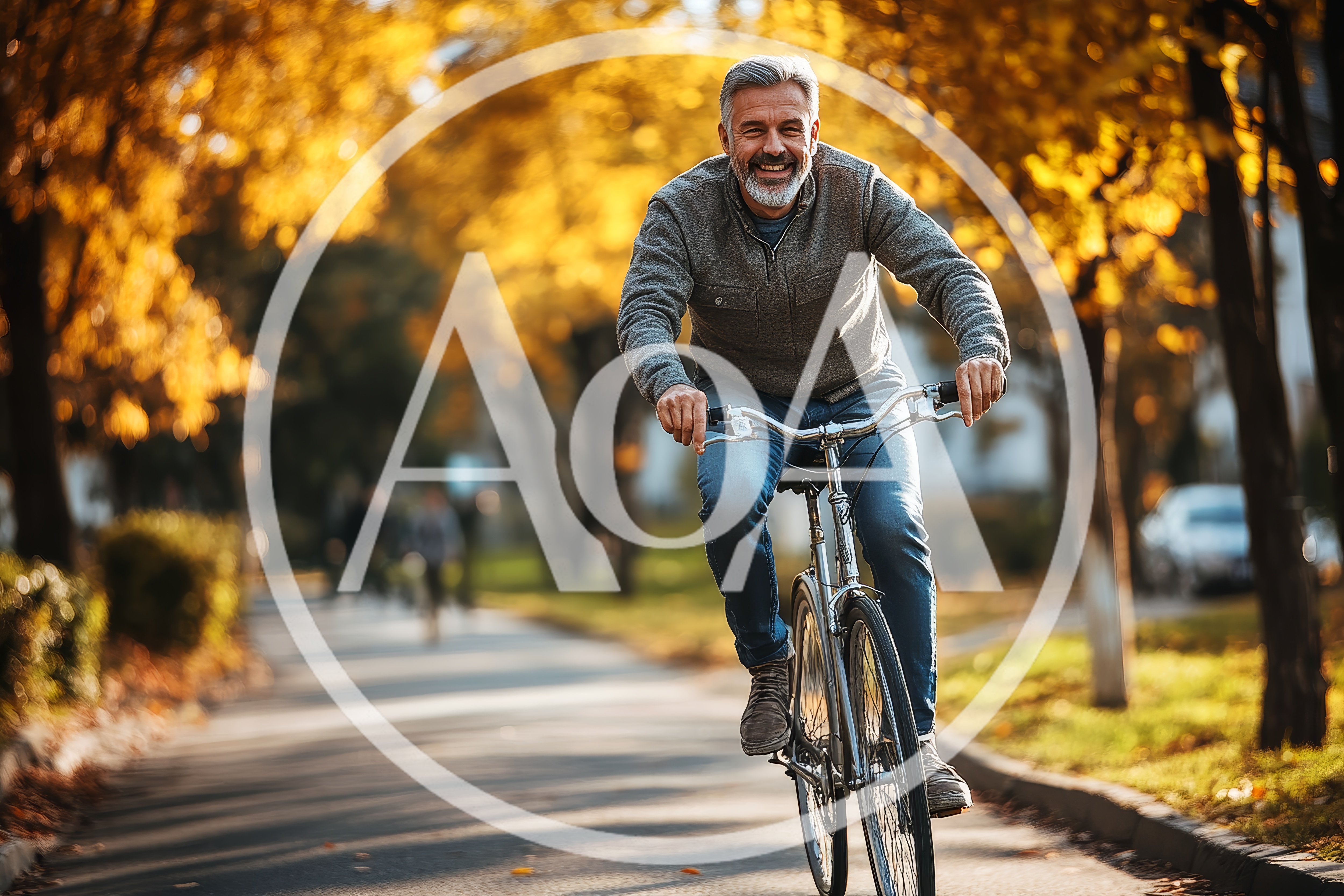 Mature Man Cycling Through Autumn Park