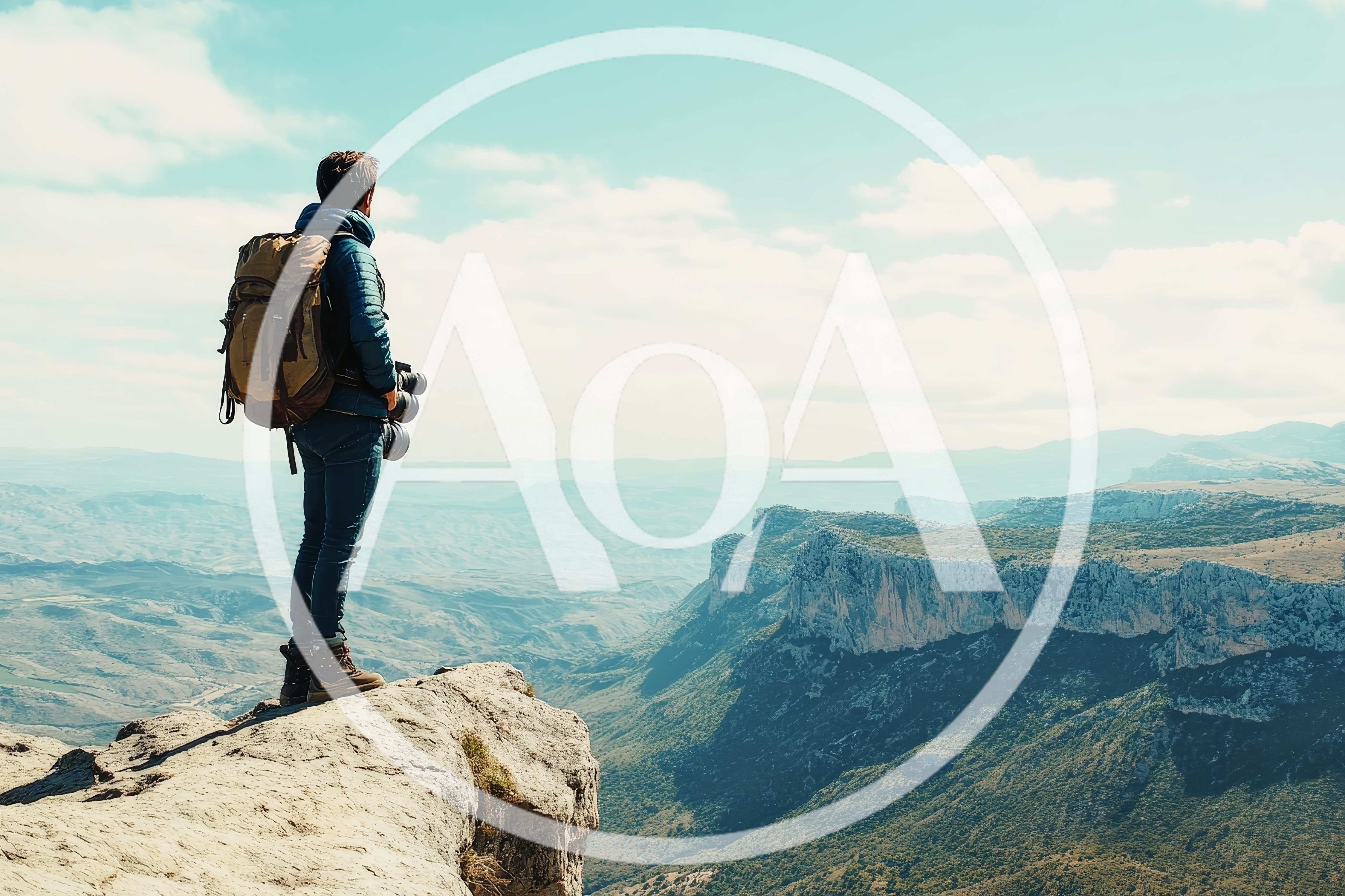 Photographer Standing On A Mountain Cliff Edge