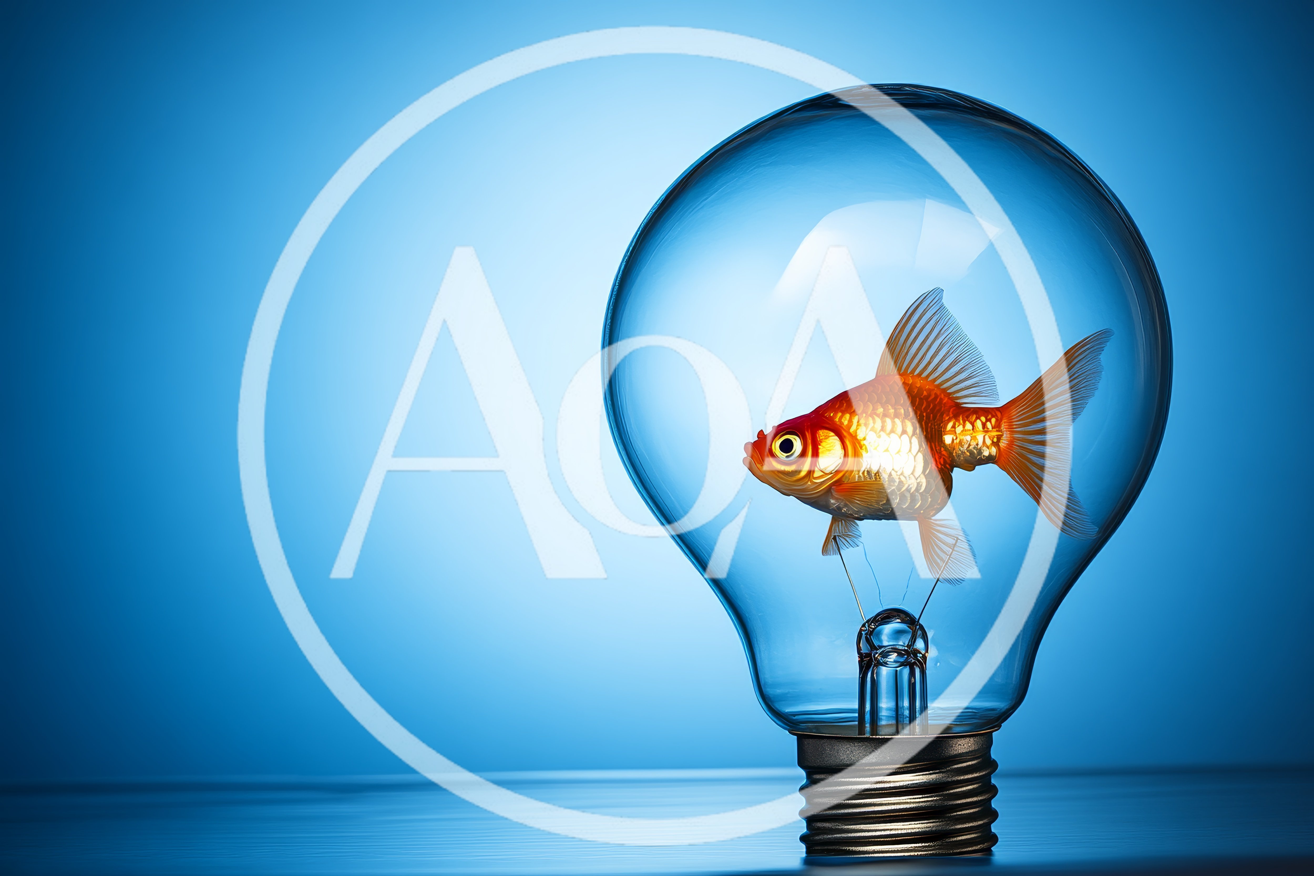 Goldfish Swimming Inside A Clear Glass Light Bulb