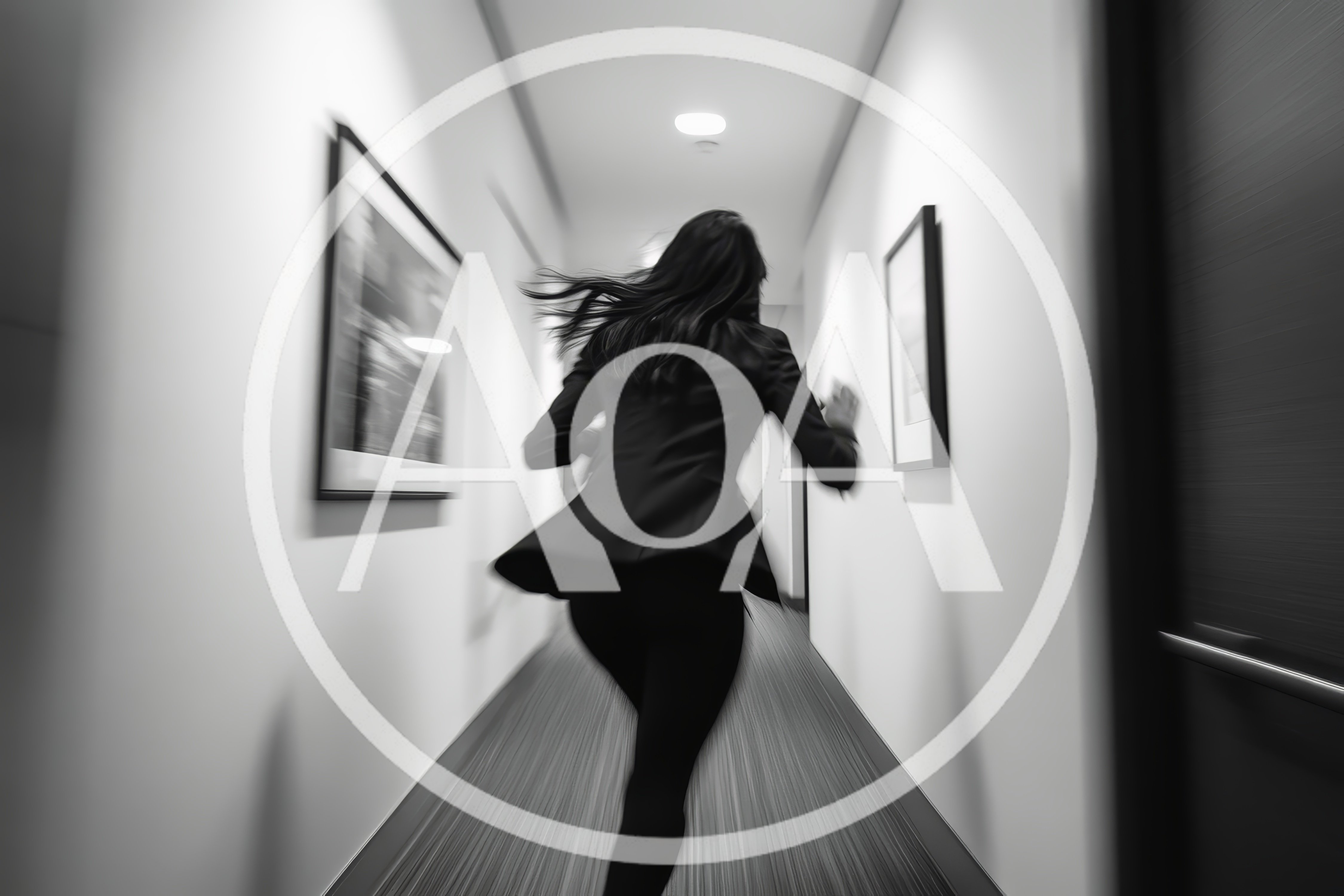 Businesswoman Running Down A Modern Office Hallway