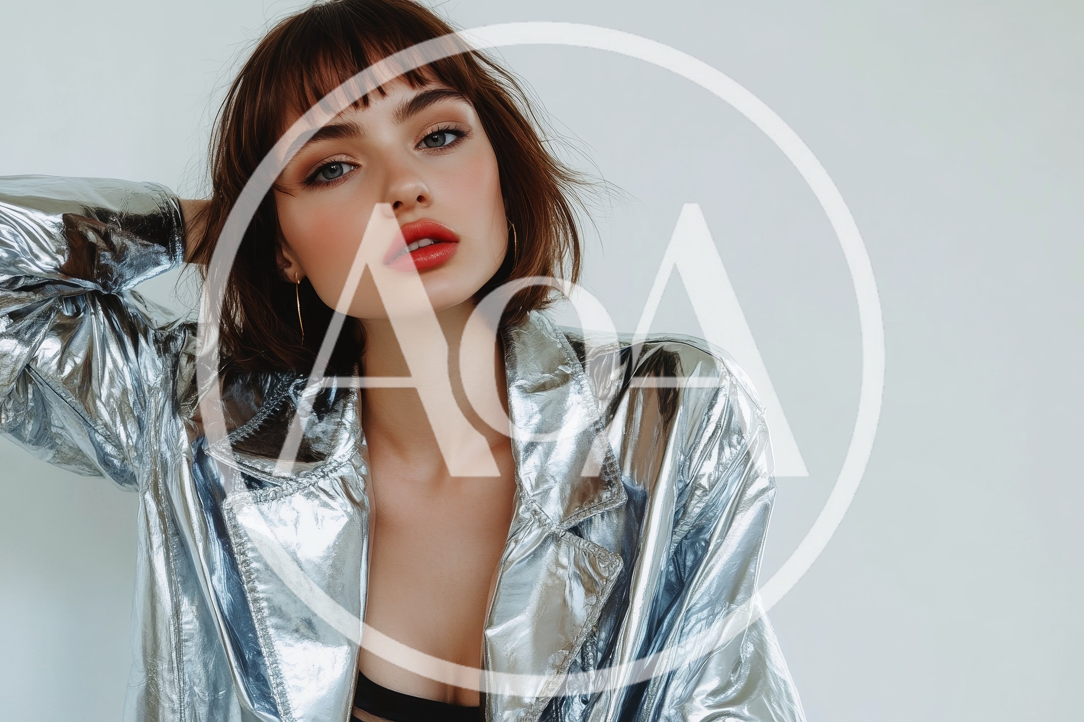 Fashion Portrait Of A Woman In A Metallic Jacket
