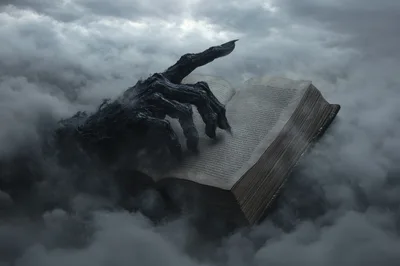 Dark Clawed Hand Touching An Ancient Mystical Book
