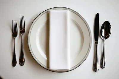 Formal Table Setting With Silverware And Napkin