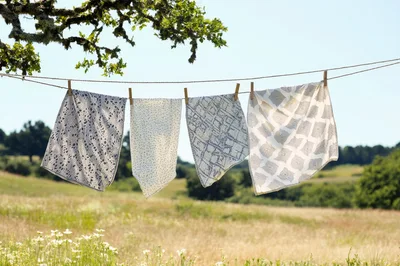 Four Patterned Cloths Drying on a Clothesline