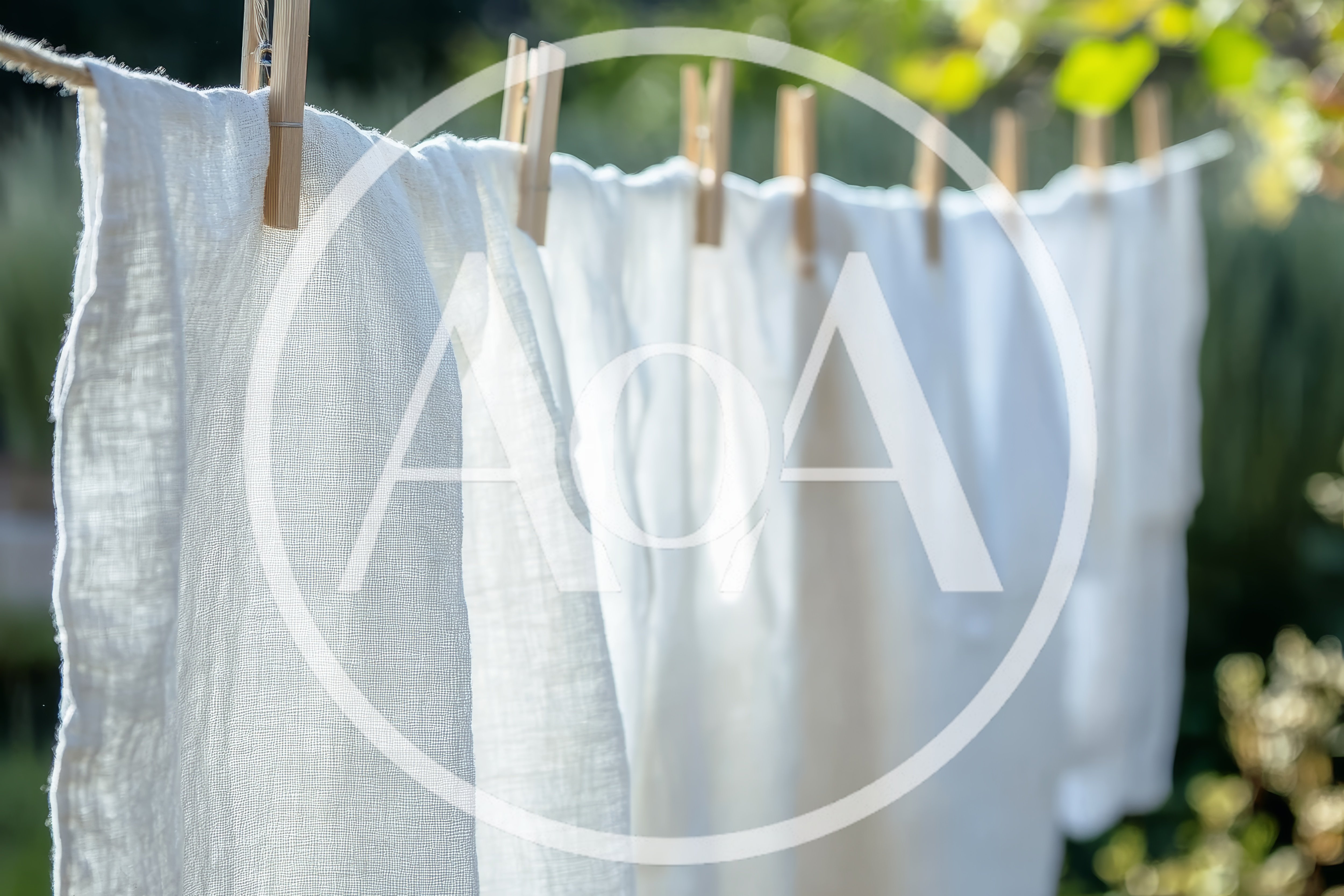 White Linen Fabric Drying On A Clothesline