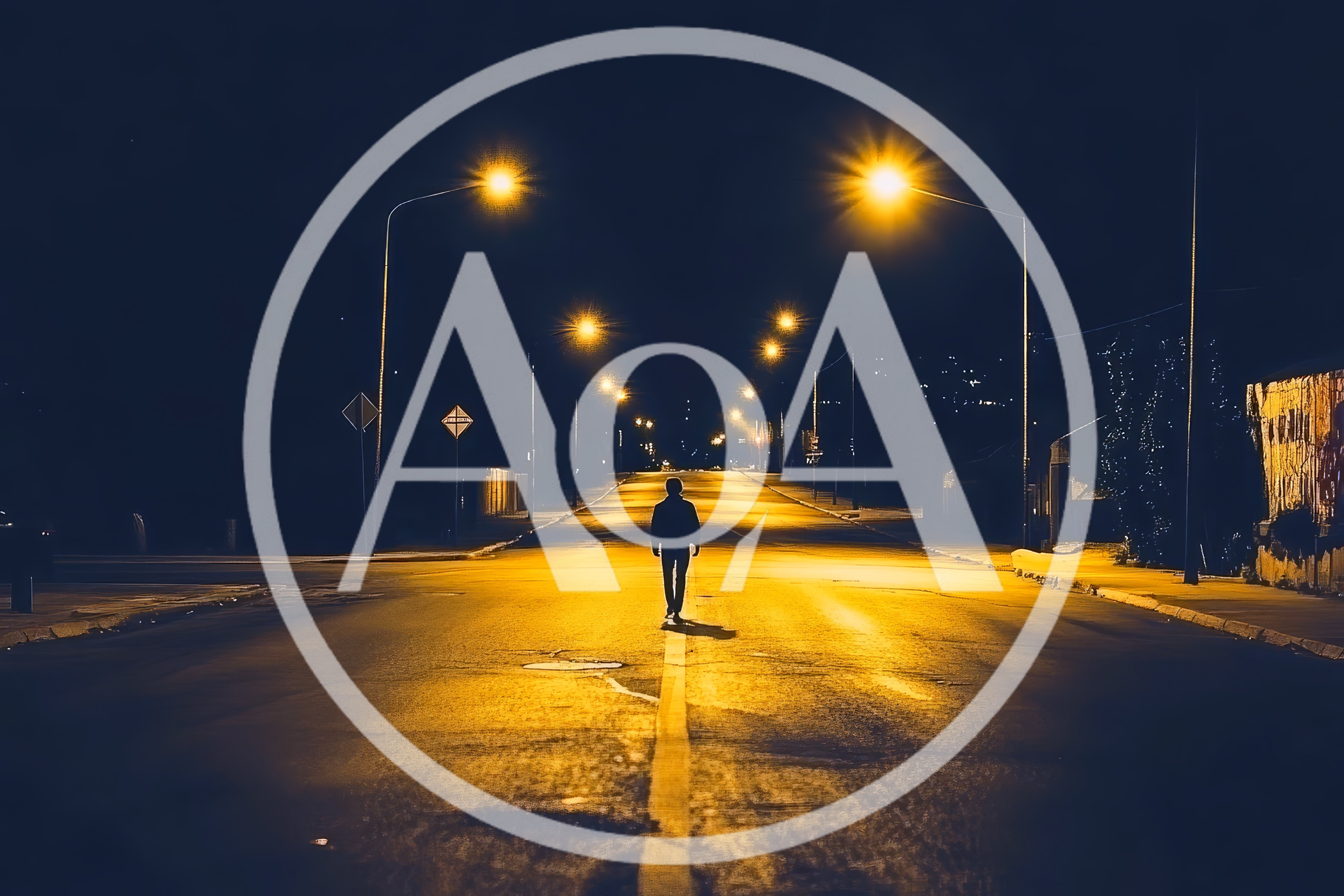 Lone Person Walking Down Empty Street At Night