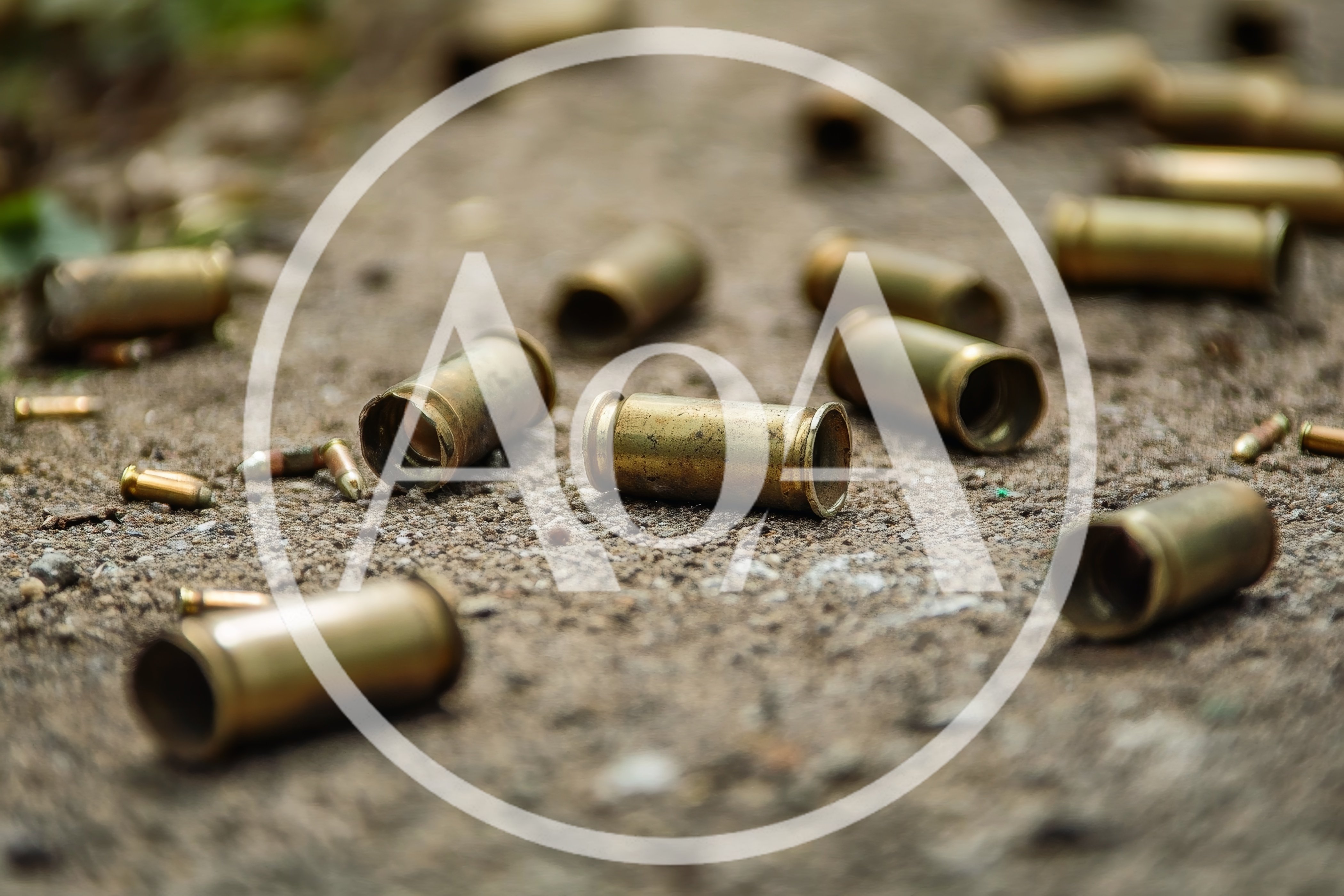 Spent Brass Bullet Casings Scattered on Ground