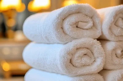 Stack Of Clean White Rolled Towels