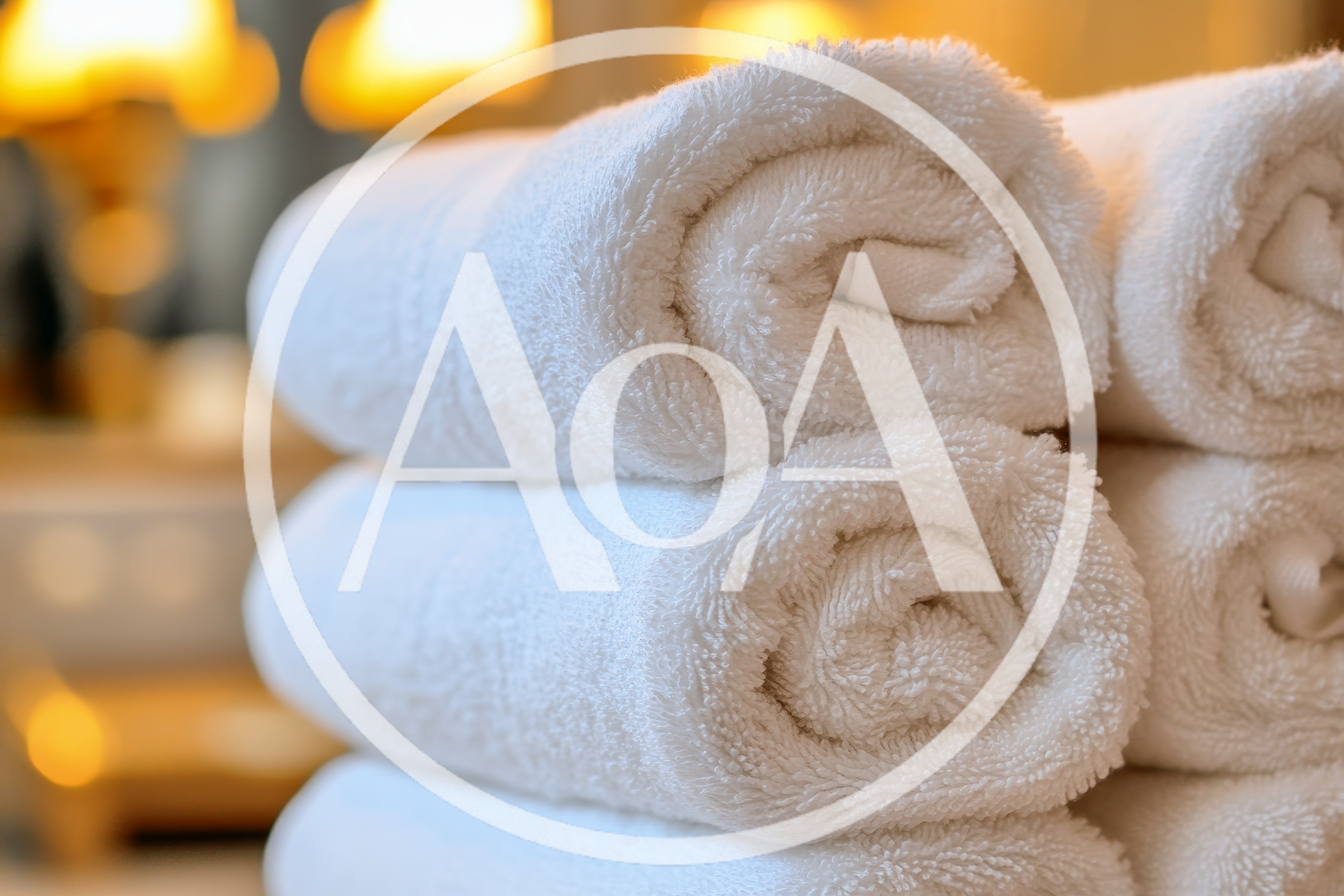 Stack Of Clean White Rolled Towels