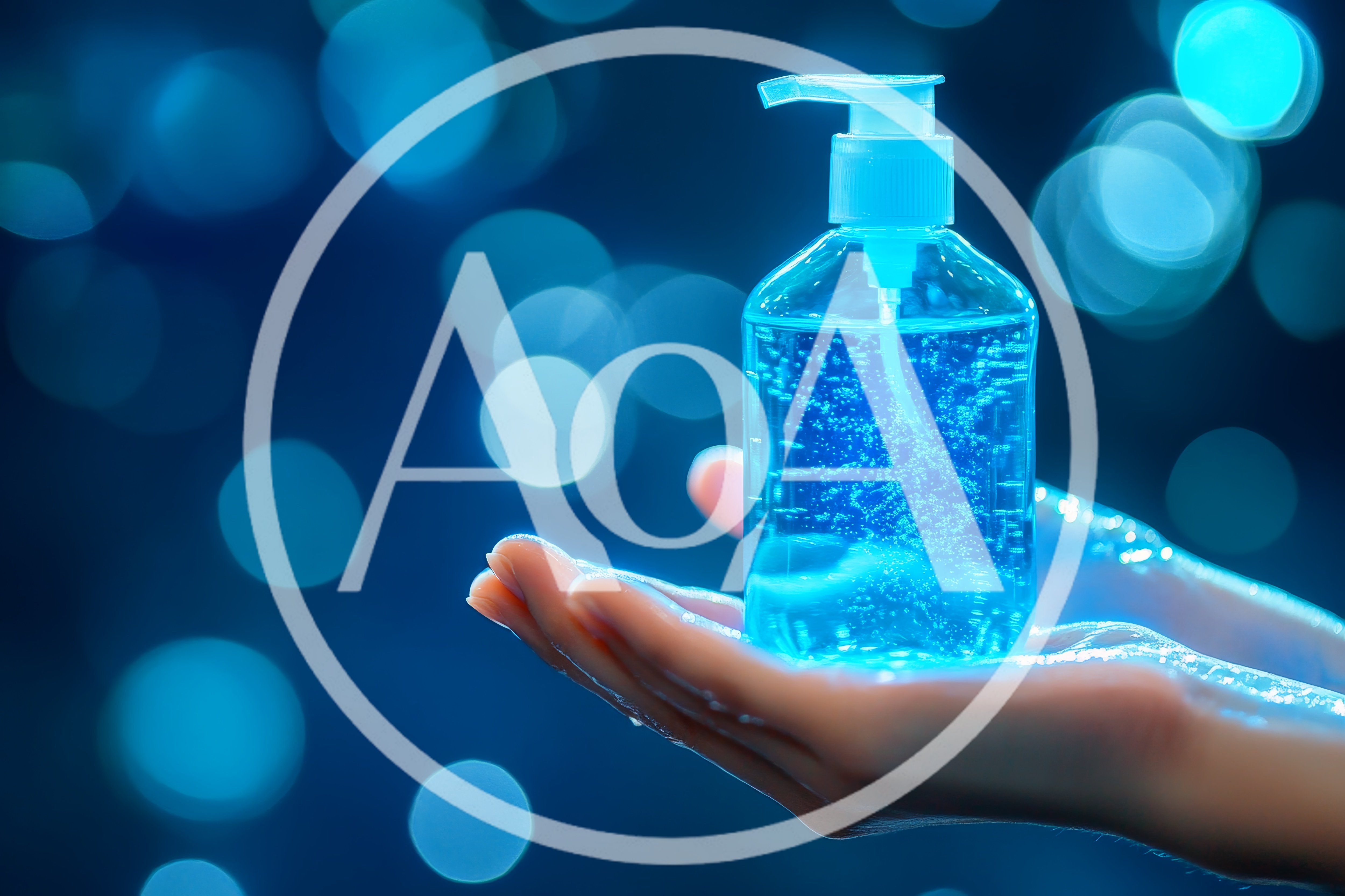 Hands Holding A Bottle Of Blue Hand Sanitizer