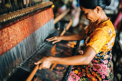 Artisan Weaver Working On A Traditional Handloom