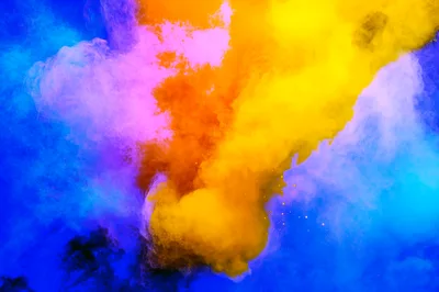 Vibrant Yellow and Orange Powder Explosion