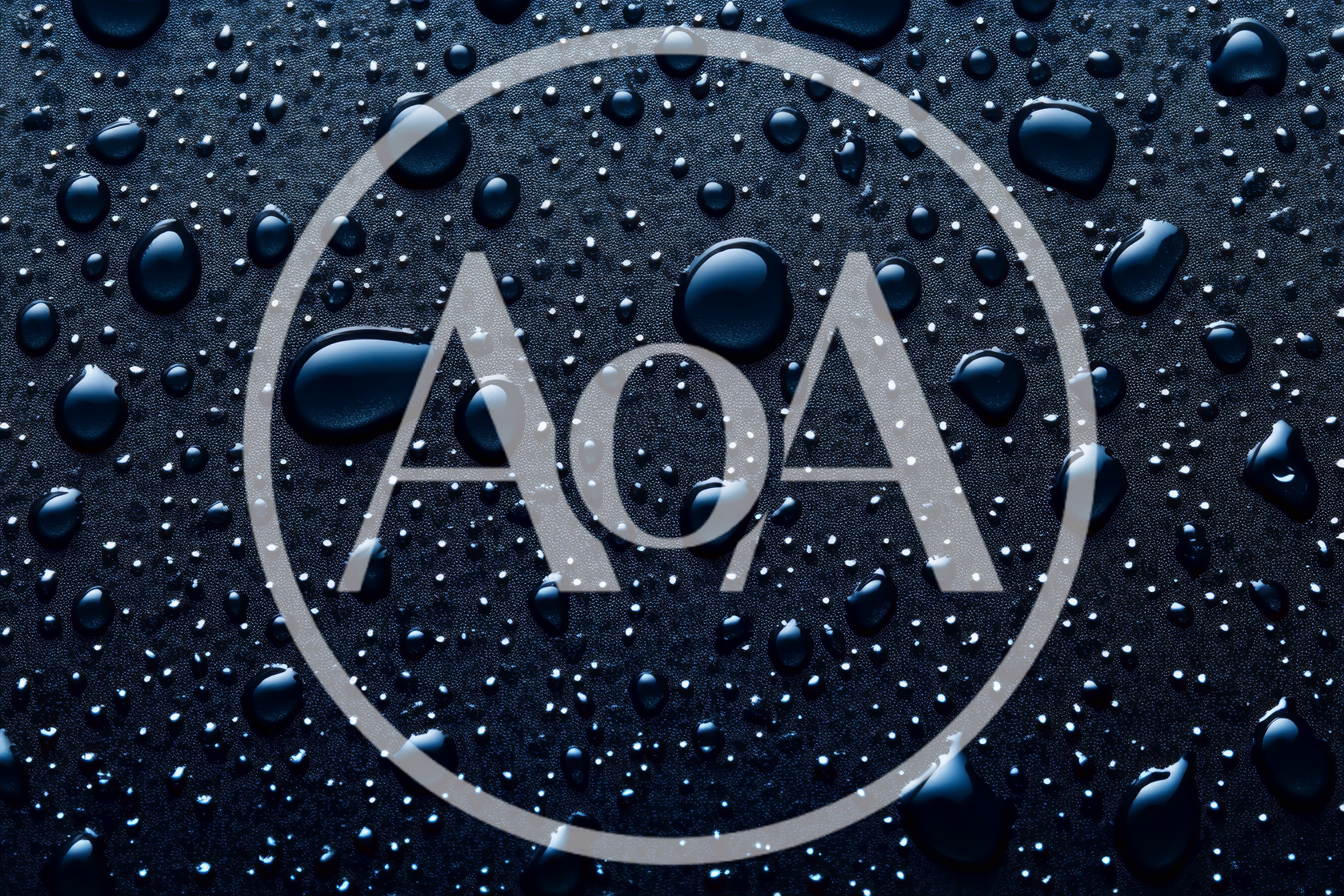 Water Droplets On A Dark Textured Surface