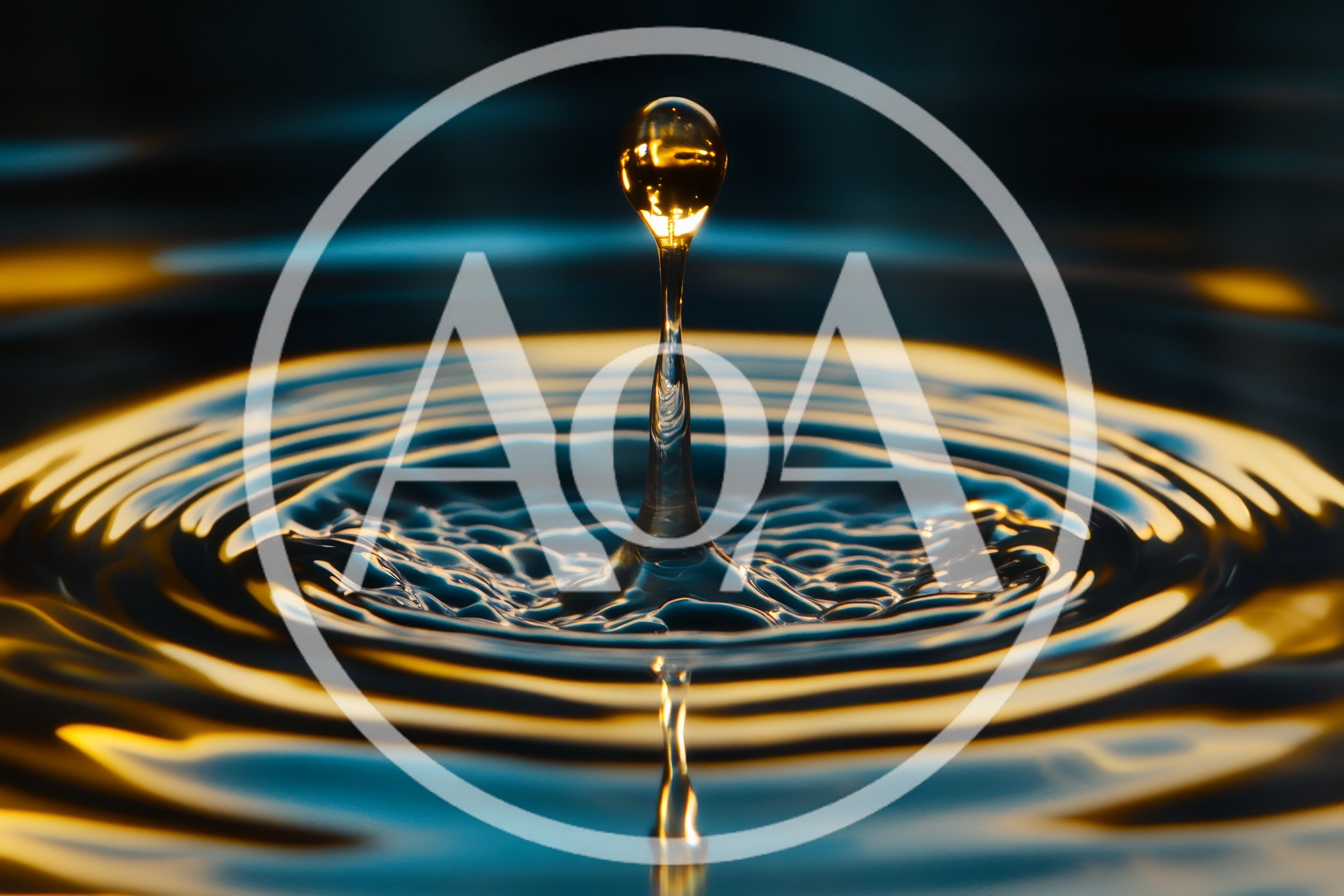 Golden Water Drop Impact Creating Concentric Ripples