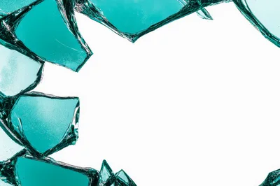 Broken Teal Glass Shards With White Background