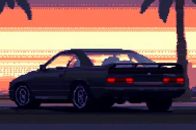 Retro Pixel Art Sports Car At Sunset