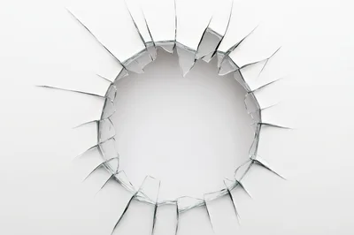 Circular Shattered Glass Hole On White Background