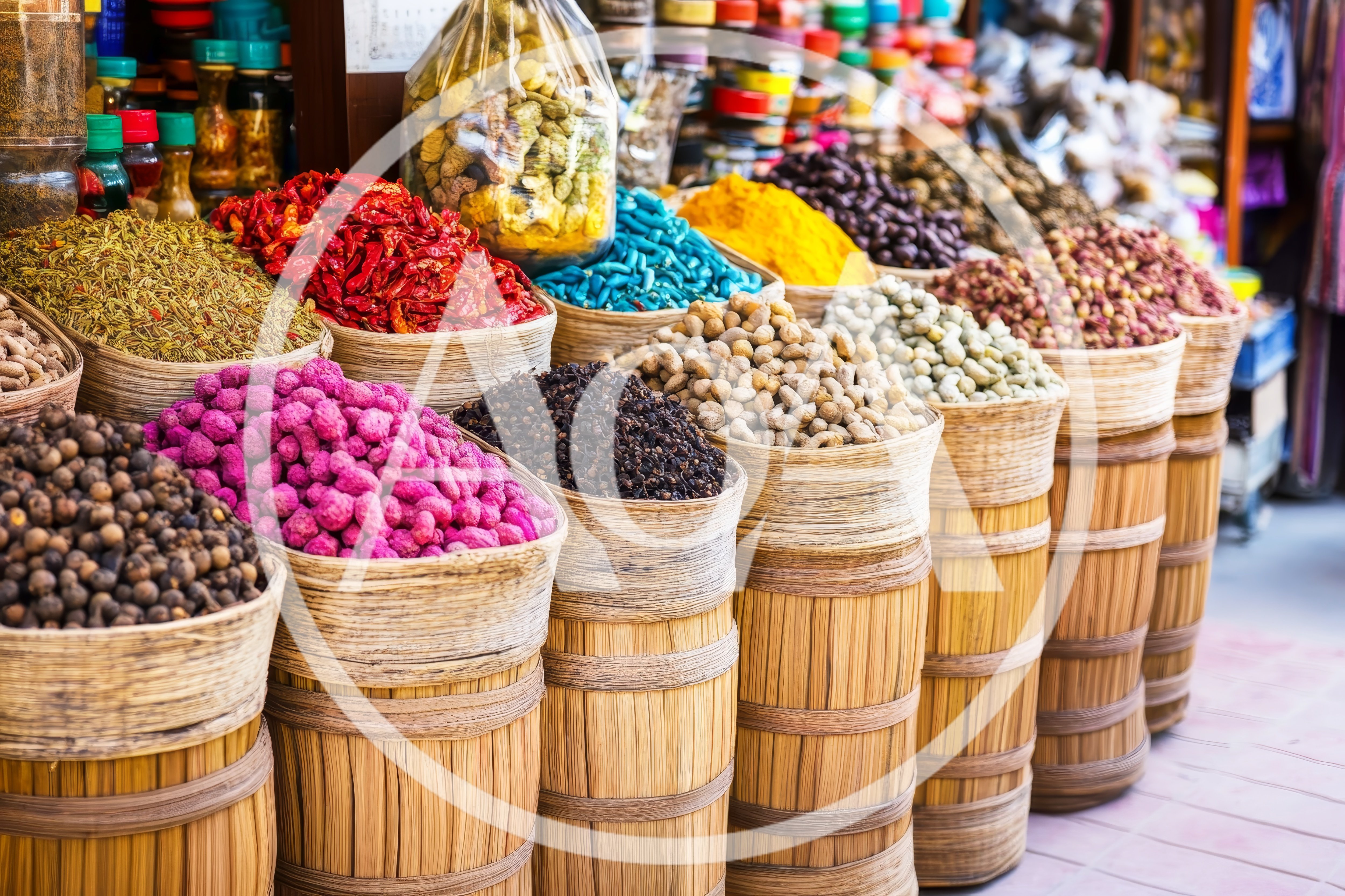 Assorted Spices And Herbs In Woven Baskets