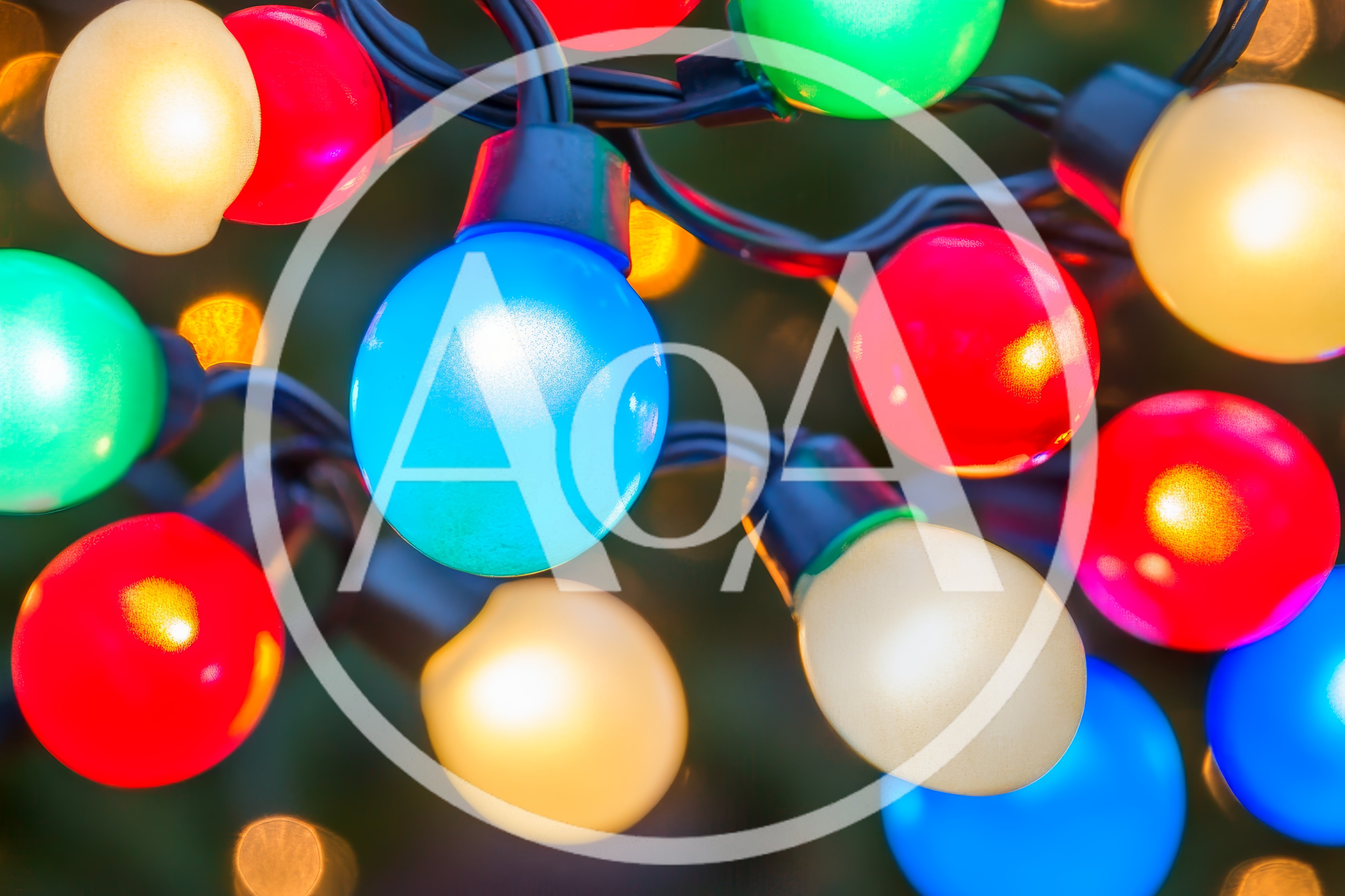 Colorful Christmas String Lights Glowing In The Dark